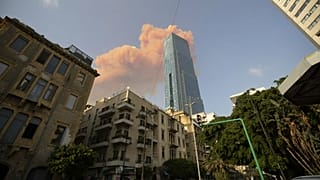 A cloud from a massive explosion is seen in in Beirut, Lebanon, Tuesday, Aug. 4, 2020