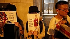 Activists form human chain at UK consulate in Hong Kong