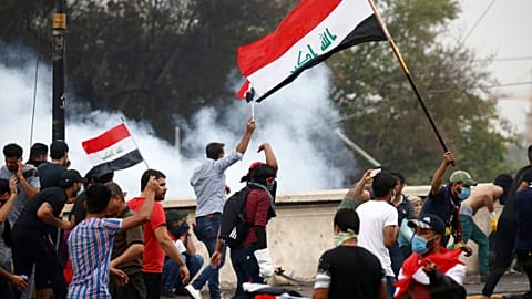 Security forces fire tear gas as protests resume in Iraq