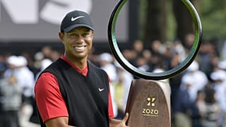 Tiger Woods consegue vitória histórica no Japão