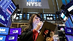 A trader works on the floor at the New York Stock Exchange (NYSE) in New York, U.S., October 31, 2019