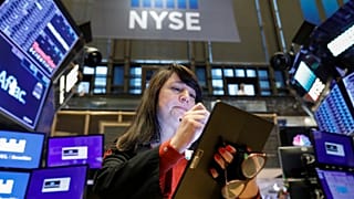 A trader works on the floor at the New York Stock Exchange (NYSE) in New York, U.S., October 31, 2019