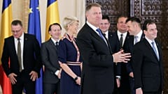 Romanian President Klaus Iohannis smiles as he adresses the audience at the end of the swearing-in ceremony of the Orban cabinet at the Cotroceni presidential palace
