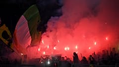 Lazio fans light flares before the match against Celtic on November 7.