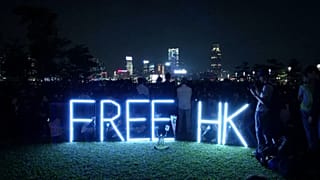 Vigil in Hong Kong after death of student protester
