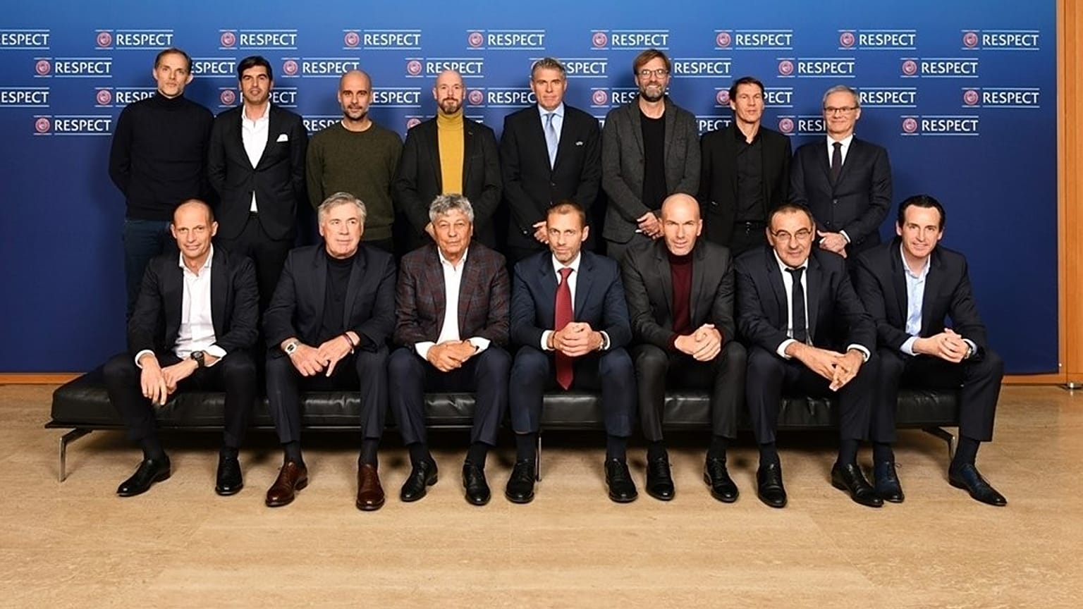 Presenti a Nyon: in piedi Tuchel, Fonseca, Guardiola, ten Hag, Rosetti, Klopp, Garcia, Marchetti. Accosciati: Allegri, Ancelotti, Lucescu, Ceferin, Zidane, Sarri, Emery.