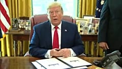President Donald Trump imposes new sanctions on Iran, freezes billions