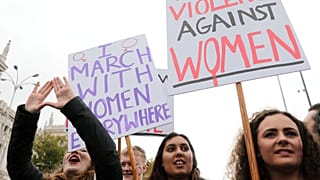 People attend a rally against gender-based and sexual violence against women in Madrid, Spain, November 25, 2018