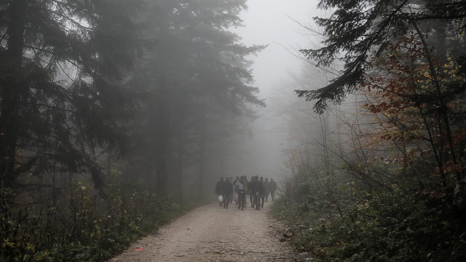 File photo of migrants crossing into Croatia from Bosnia on November 14.