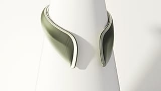 The Atmosphère Collar is a wearable device designed to provide environmental protection
