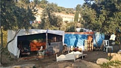 A refugee camp in Greece which will be replaced with a closed detention centre
