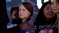 Greta Thunberg (left) and her doppelganger