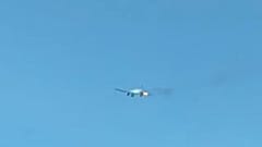 Plane makes emergency landing after flames burst from engine