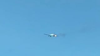 Plane makes emergency landing after flames burst from engine