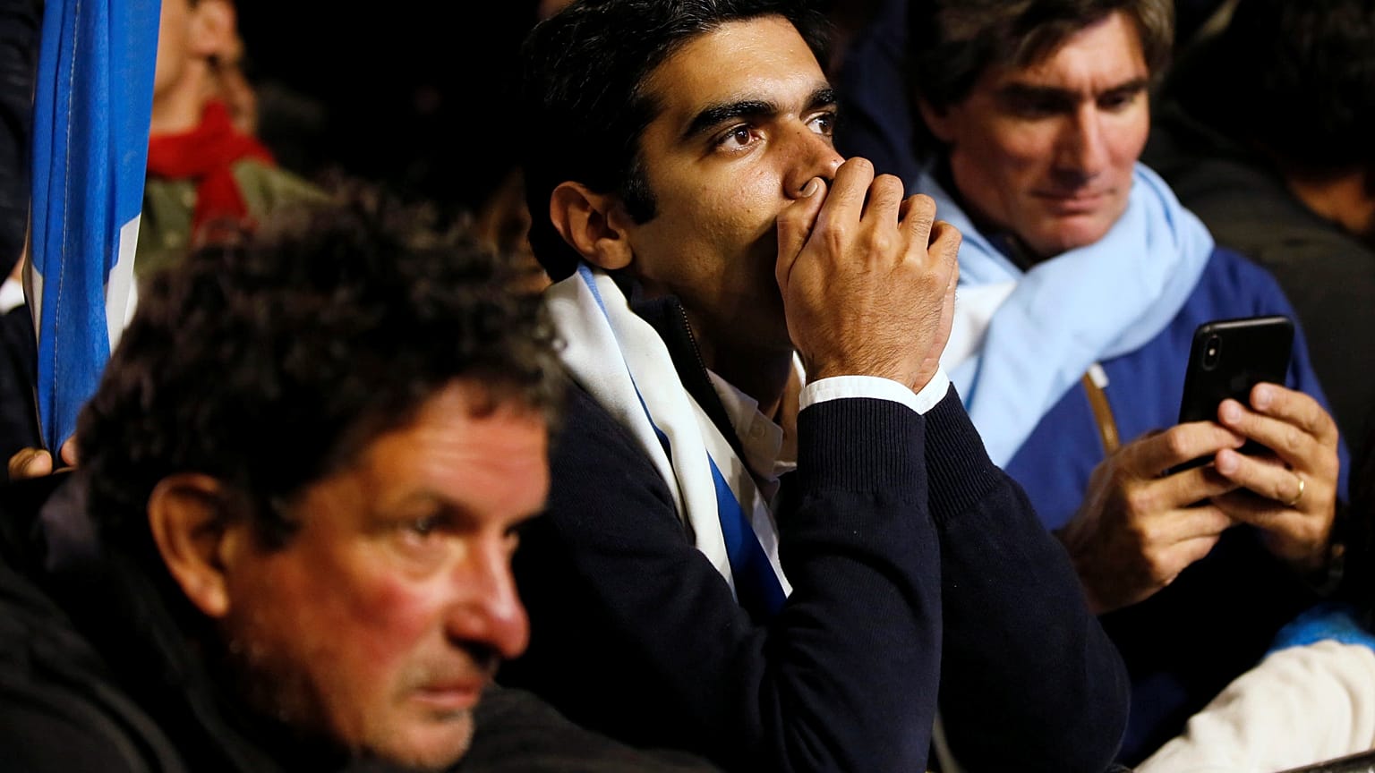 Supporters of National Party presidential candidate Luis Lacalle Pou wait for the results after the second-round presidential election, in Montevideo, Uruguay November 24,