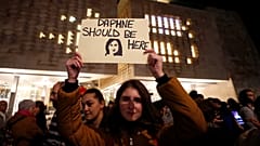 Watch: Protesters gather outside Malta's parliament as journalist murder scandal deepens