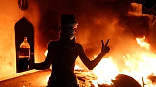 An Iraqi demonstrator in front of the Iranian consulate in Najaf