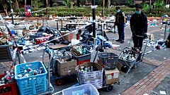 Police officers gather forensic evidence at the campus of the Polytechnic University (PolyU) in Hong Kong