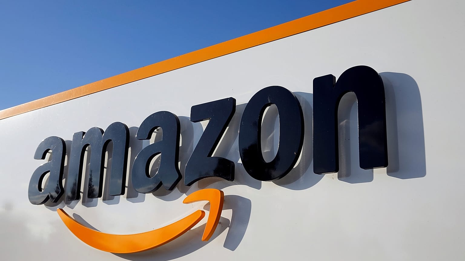 The logo of Amazon is seen at the company logistics centre in Boves, France