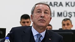 Turkish Defence Minister Hulusi Akar attends a briefing at the Land Forces' Forward Joint Operation Command Center in Sanlıurfa