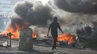 Iraqi PM says he will quit as deadly protests in the country escalate