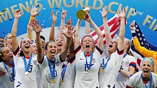 The US women's team, led by Rapinoe, celebrates winning the 2019 World Cup