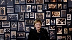 Merkel visits Auschwitz memorial for the first time after 14 years as Germany's Chancellor 