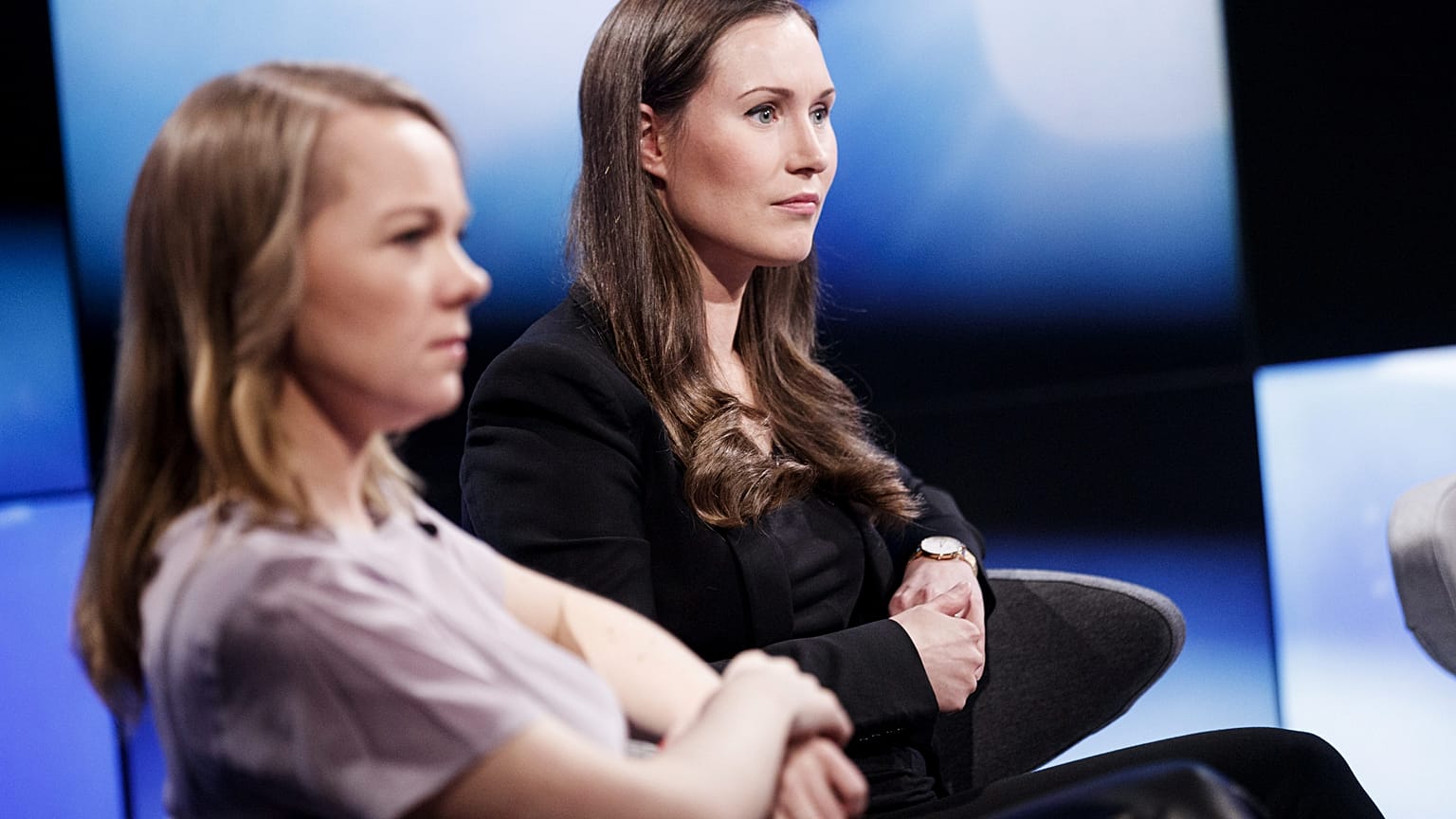 Finland's Members of Parliament, Katri Kulmuni (L) and Sanna Marin participate in the A-studio talk show in Helsinki, Finland December 3, 2019.