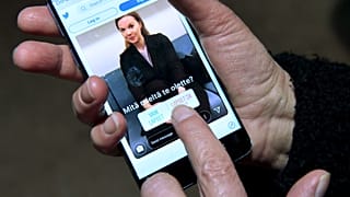 An Instagram post depicting Finnish Finance Minister Katri Kulmuni is seen on a phone running the Twitter app in Helsinki, Finland December 13, 2019.