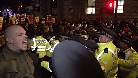 Anti-Johnson protesters clash with police during demonstrations in central London