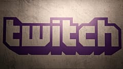 The logo of live streaming video platform Twitch is pictured at the Paris games week in Paris, Saturday, Nov. 4, 2017. (AP Photo/Christophe Ena)