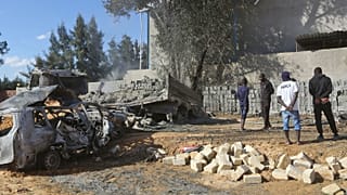 FILE PHOTO:  Aftermath of a reported air strike on a factory south of the Libyan capital Tripoli, November 2019