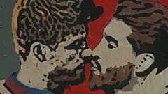 Graffiti in Barcelona shows rival El Clasico footballers kissing