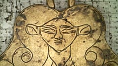 Archaeologists found this gold pendant in one of the tombs
