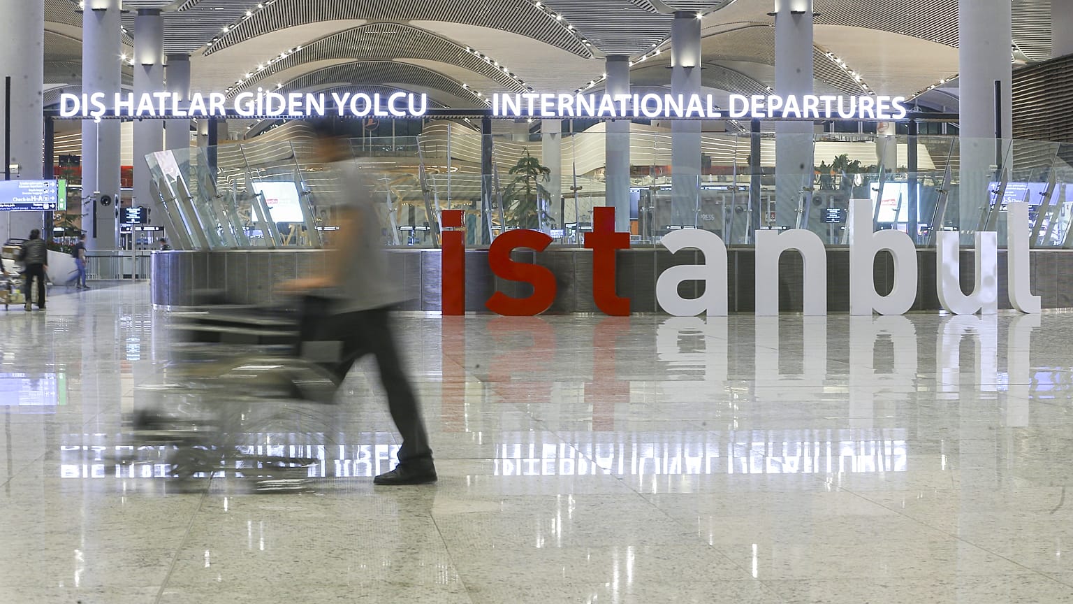 İ