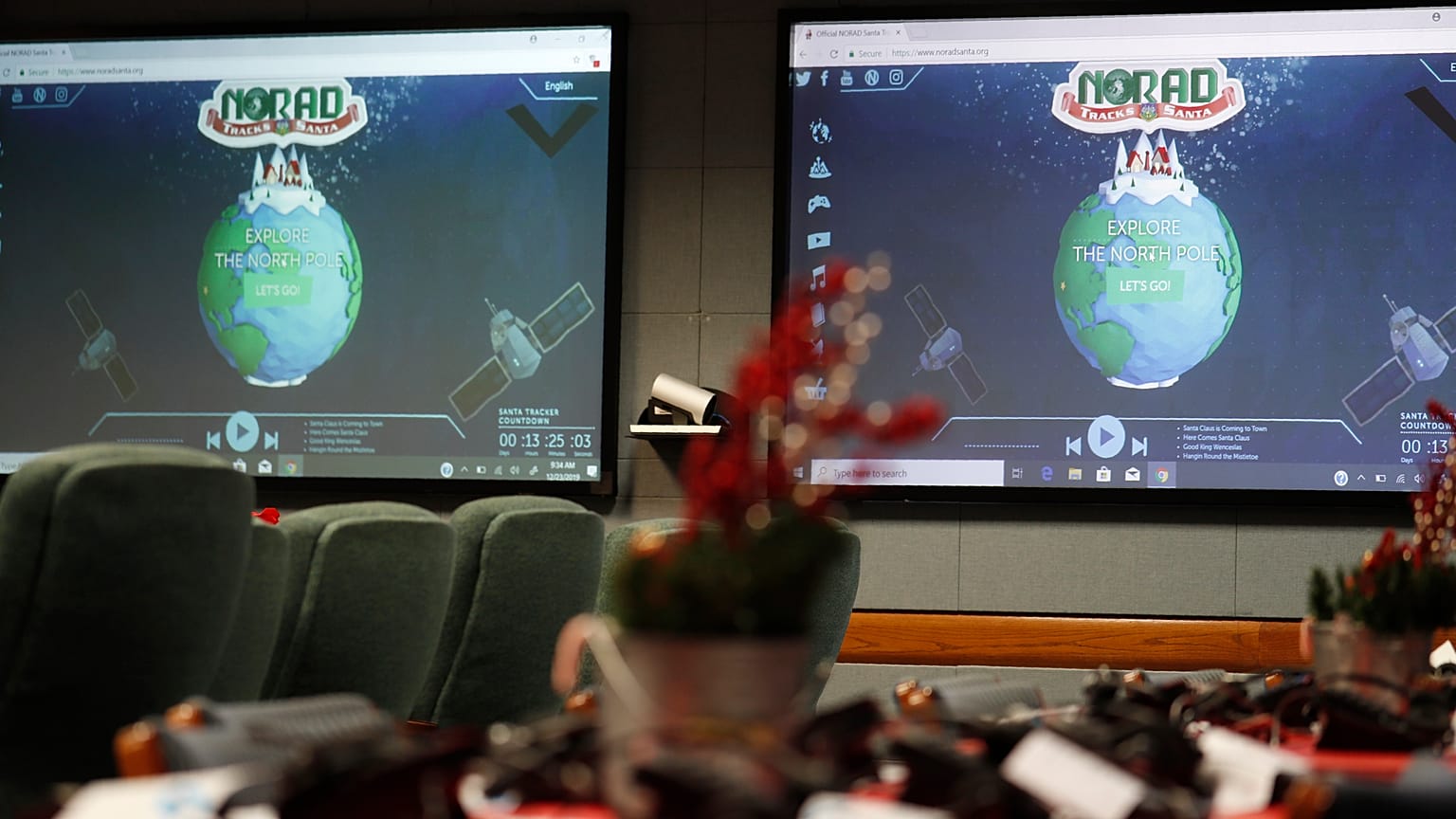 Monitors are illuminated in the NORAD Tracks Santa center at Peterson Air Force Base 