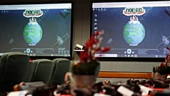 Monitors are illuminated in the NORAD Tracks Santa center at Peterson Air Force Base 