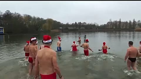 Berlin swimmers take the plunge for Christmas