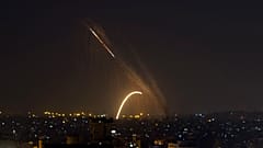FILE PHOTO: Rockets are launched from the Gaza Strip towards Israel, Wednesday, Nov. 13, 2019. 