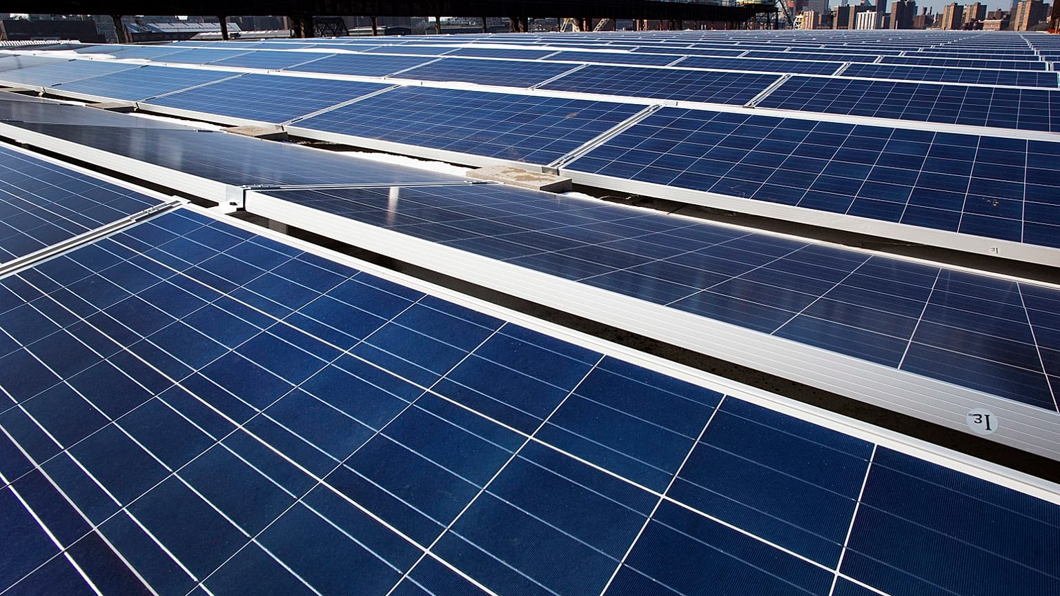 A rooftop is covered with solar panels at the Brooklyn Navy Yard, Tuesday, Feb. 14, 2017, in New York