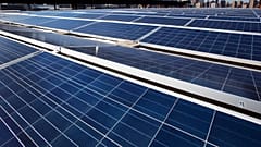 A rooftop is covered with solar panels at the Brooklyn Navy Yard, Tuesday, Feb. 14, 2017, in New York