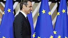 Greek Prime Minister Kyriakos Mitsotakis arrives for an EU summit in Brussels, Thursday, Dec. 12, 2019. 