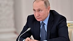 Russian President Vladimir Putin attends the State Council meeting on the agricultural policy at the Kremlin in Moscow, Russia, Thursday, Dec. 26, 2019. 