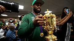 South African Springbok rugby captain Siya Kolisi with the Web Ellis trophy arrives back on home soil at the O.R. Tambo Airport in Johannesburg Tuesday, Nov. 5, 2019. 