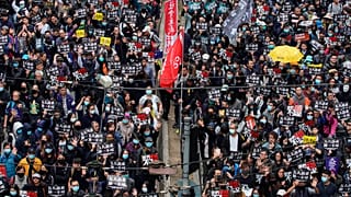 Hong Kong people participate in their annual pro-democracy march to insist their five demands be matched by the government in Hong Kong.