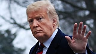 President Donald Trump walks on the South Lawn upon arrival at the White House in Washington, Saturday, Jan. 19, 2019.