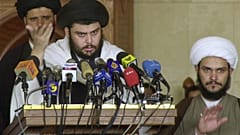 مقتدى الصدر خلال مؤتمر صحافي (صورة من الأرشيف) 