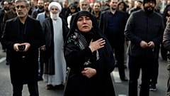 A woman mourns in a demonstration over the U.S. airstrike in Iraq that killed Iranian Revolutionary Guard Gen. Qassem Soleimani in Tehran, Iran, Jan. 3, 2020. 