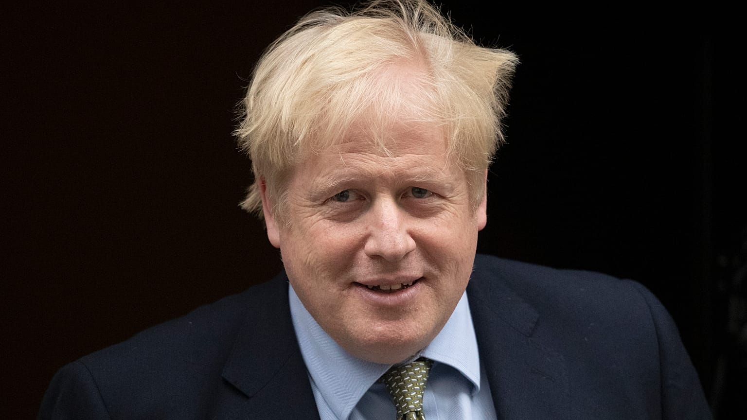 British Prime Minister Boris Johnson leaves 10 Downing Street in London, to attend Prime Minister's Questions at the Houses of Parliament, Wednesday, Jan. 8, 2020. 