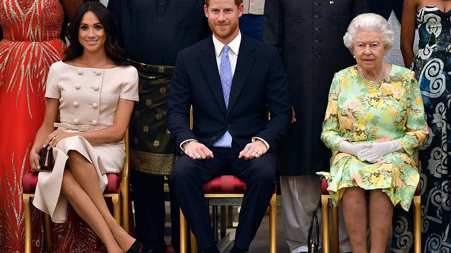 Queen Elizabeth II with the Duke and Duchess of Sussex at the Queen's Young Leaders Awards Ceremony at Buckingham Palace, London, Tuesday June 26, 2018. 